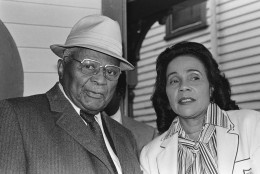 The Rev. Martin Luther King Sr., father of slain civil rights leader Martin Luther King Jr., and Coretta Scott King, right,  widow of the slain leader,stand outside the house in Atlanta, Ga.  where the civil right leader was born.  This is a 1984 photo.      (AP Photo)