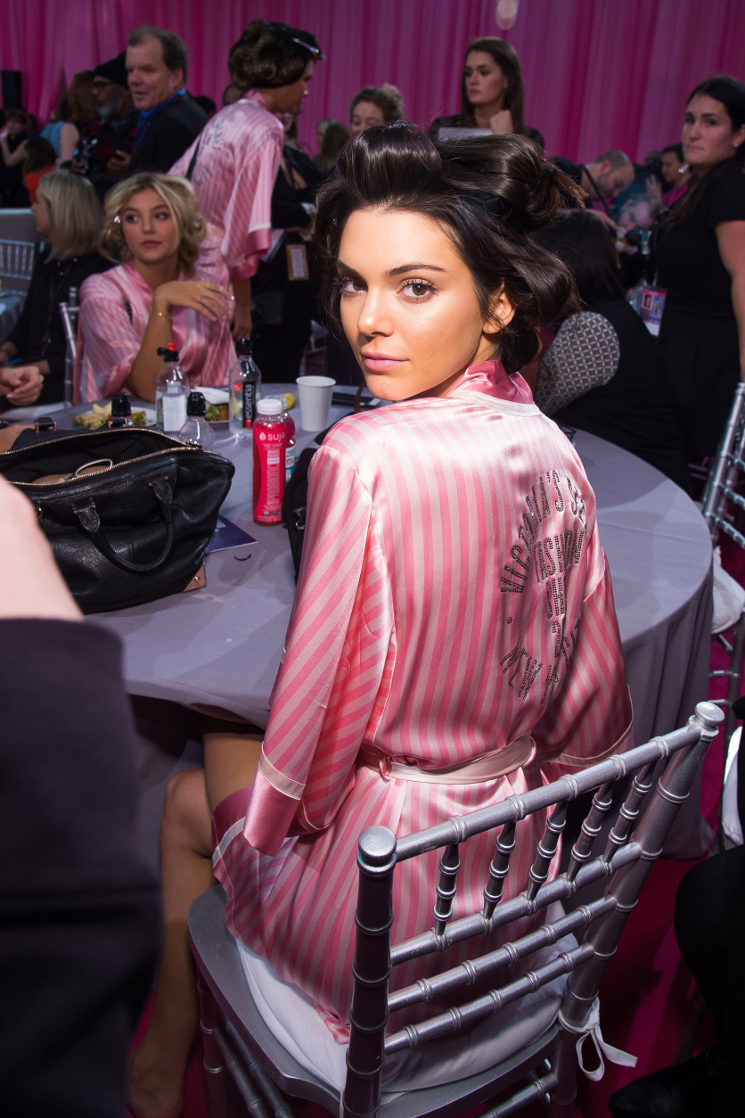 Kendall Jenner appears backstage in hair and makeup at the 2015 Victoria Secret Fashion Show at the Lexington Armory on Tuesday, Nov. 10, 2015, in New York. The Victorias Secret Fashion Show will air on CBS on Tuesday, December 8th at 10pm EST. (Photo by Charles Sykes/Invision/AP)