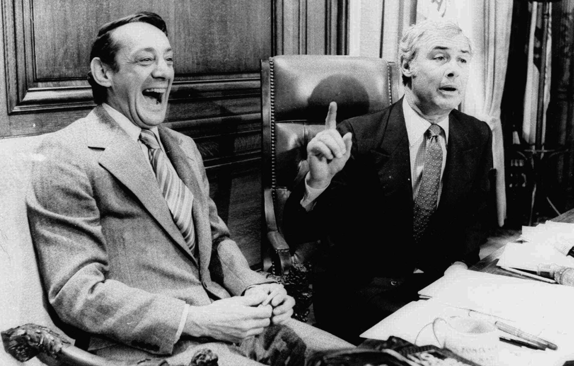 FILE - In this April 1977 file photo, San Francisco Supervisor Harvey Milk, left, and Mayor George Moscone are shown in the mayor's office during the signing of the city's gay rights bill. Officials and LGBT advocates are proposing naming a Salt Lake City street after Milk, one of the first openly gay elected officials in the United States. If passed, the move would be the latest illustration of the progressive nature of Utahs capital city despite being located in a conservative state. (AP Photo/File)