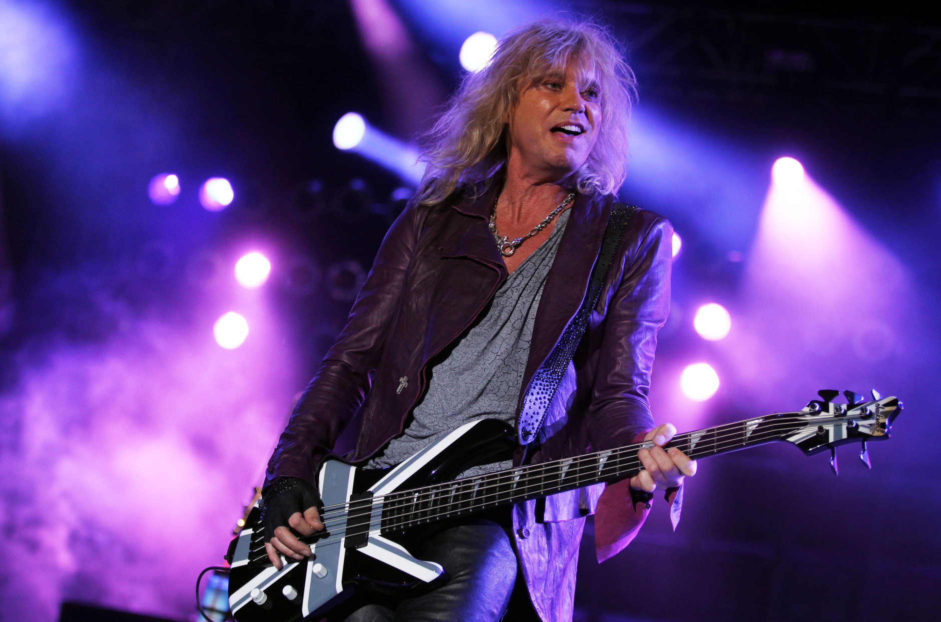 Rick Savage performs with the band Def Leppard at the after party for the "Rock of Ages" premiere on Friday June 8, 2012, in Los Angeles. (Photo by Matt Sayles/Invision/AP)