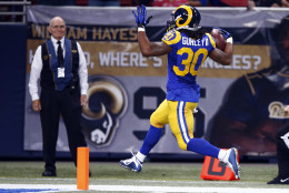 St. Louis Rams running back Todd Gurley scores on a 71-yard run during the second quarter of an NFL football game against the San Francisco 49ers, Sunday, Nov. 1, 2015, in St. Louis. (AP Photo/Billy Hurst)