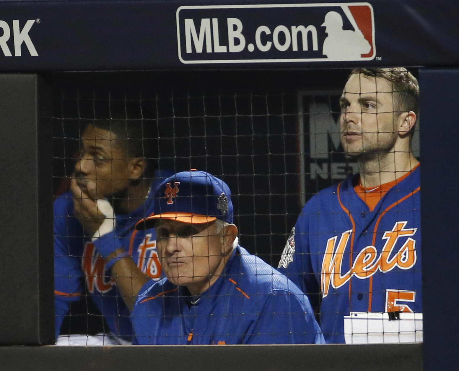 New York Mets manager Terry Collins watches with David Wright, right, the 11th inning of Game 5 of the Major League Baseball World Series against the Kansas City Royals Sunday, Nov. 1, 2015, in New York. (AP Photo/Matt Slocum)