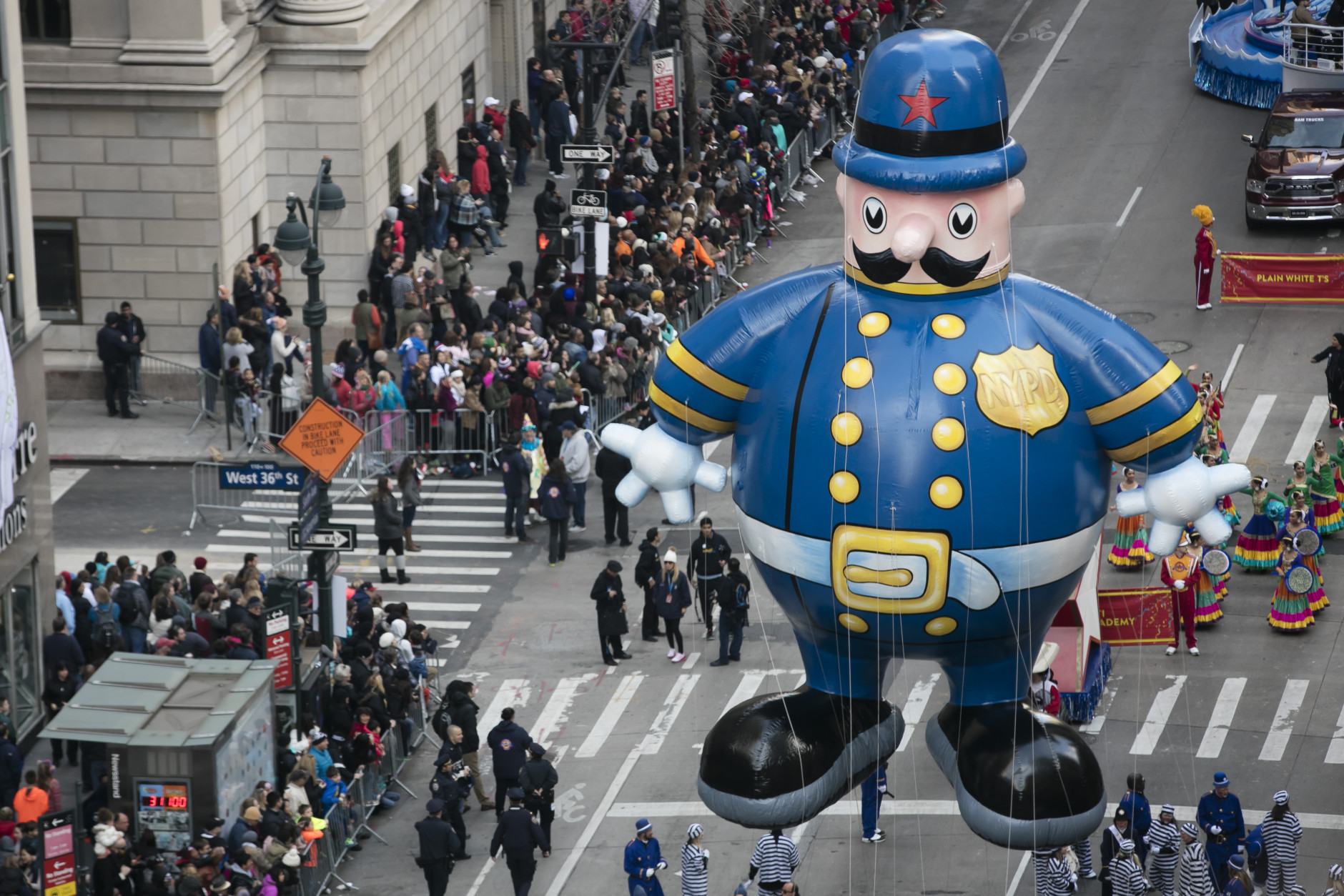 The Police Officer balloon goes down 6th Avenue for the 89th annual Macy's Thanksgiving Day Parade as seen from above street level on Thursday, Nov. 26, 2015, in New York. (Photo by Ben Hider/Invision/AP)