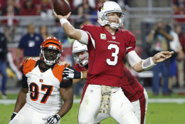 Arizona Cardinals quarterback Carson Palmer (3) throws against the Cincinnati Bengals during the first half of an NFL  football game, Sunday, Nov. 22, 2015, in Glendale, Ariz. (AP Photo/Ross D. Franklin)