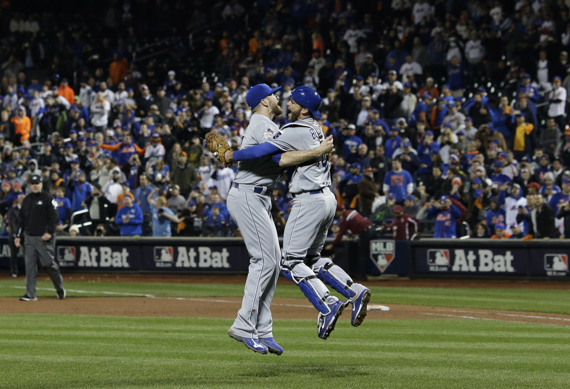 Kansas City Royals pitcher Wade Davis (17) celebrates with Drew Butera after Game 5 of the Major League Baseball World Series against the New York Mets Monday, Nov. 2, 2015, in New York. The Royals won 7-2 to win the series. (AP Photo/Matt Slocum)