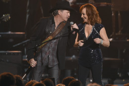 Kix Brooks, left, of Brooks and Dunn, and Reba McEntire perform at the 49th annual CMA Awards at the Bridgestone Arena on Wednesday, Nov. 4, 2015, in Nashville, Tenn. (Photo by Chris Pizzello/Invision/AP)
