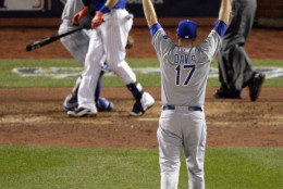 Kansas City Royals relief pitcher Wade Davis reacts after their win against the New York Mets in Game 5 of the Major League Baseball World Series Monday, Nov. 2, 2015, in New York. The Royals won 7-2 to win the series. (AP Photo/Charlie Riedel)