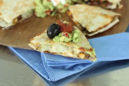 This July 13, 2015 photo shows chickpea, zucchini and chicken quesadillas in Concord, N.H. This dish is from a recipe by Allison Ladman. (AP Photo/Matthew Mead)