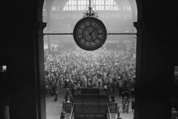 A large group of people at Penn Station, waiting for transportation for the long Memorial Day weekend, amass around the gates leading to their trains in New York, May 28, 1948. (AP Photo/Matty Zimmerman)