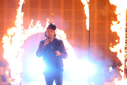 The Weeknd performs at the American Music Awards at the Microsoft Theater on Sunday, Nov. 22, 2015, in Los Angeles. (Photo by Matt Sayles/Invision/AP)