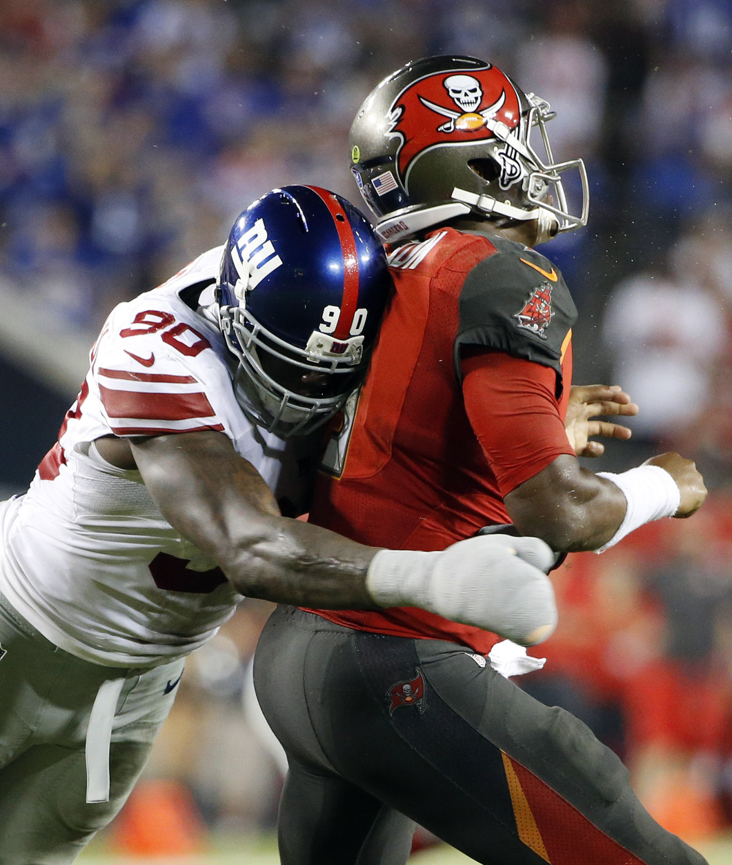 New York Giants defensive end Jason Pierre-Paul (90) hits Tampa Bay Buccaneers quarterback Jameis Winston (3) after a pass attempt during the fourth quarter of an NFL football game Sunday, Nov. 8, 2015, in Tampa, Fla. (AP Photo/Brian Blanco)