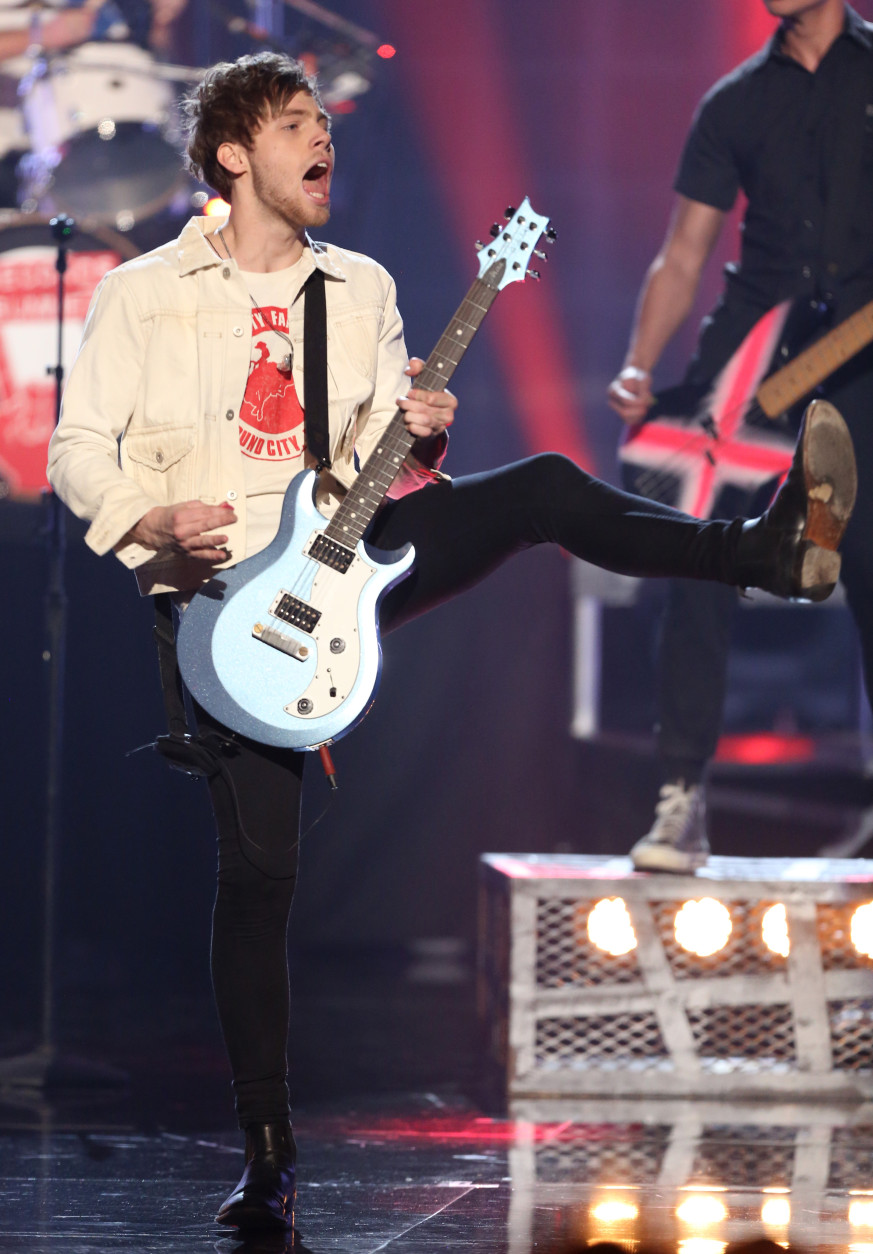 Luke Hemmings of 5 Seconds of Summer performs at the American Music Awards at the Microsoft Theater on Sunday, Nov. 22, 2015, in Los Angeles. (Photo by Matt Sayles/Invision/AP)