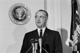 U.S. President  Lyndon Johnson makes his first formal address to the American people as their new chief executive, speaking from the Fish Room in the White House November 23, 1963 over a television-hookup.   Johnson proclaimed Monday as a day of mourning for the assassinated President John F. Kennedy.   The seal of the President of the United States is at left. (AP Photo)