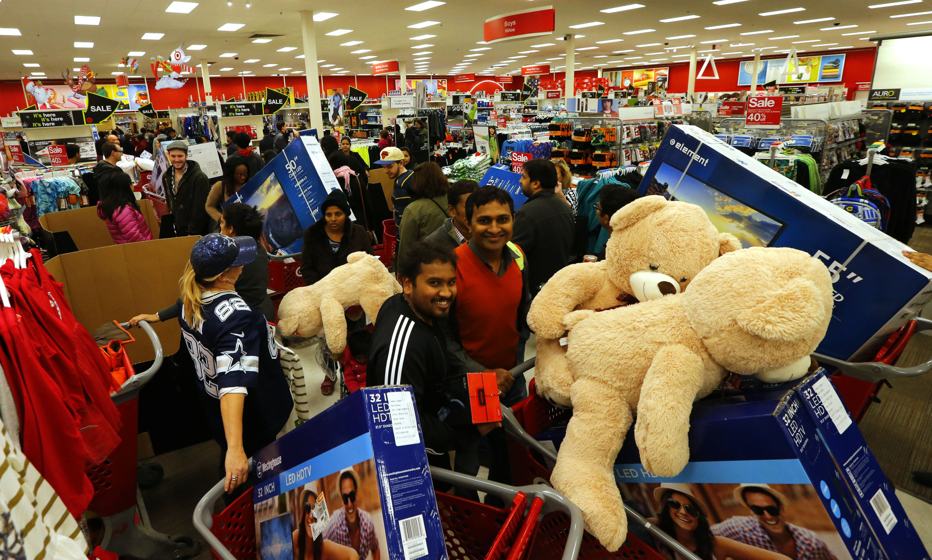 IMAGE DISTRIBUTED FOR TARGET - Guests take advantage of Target's Black Friday sales at the Jersey City, N.J. store Thursday, Nov. 26, 2015. (Noah K. Murray/ AP Images for Target)