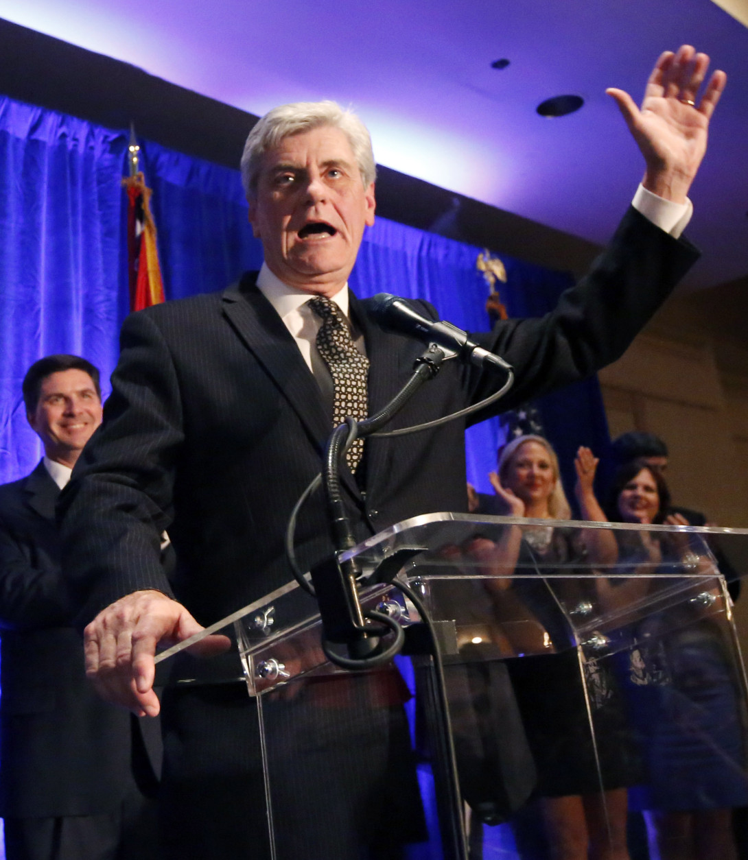 Republican Gov. Phil Bryant speaks to friends and supporters after he is elected to his second term, Tuesday, Nov. 3, 2015 in Jackson, Miss. (AP Photo/Rogelio V. Solis)