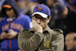 A New York Mets fan reacts during the 12th inning of Game 5 of the Major League Baseball World Series against the Kansas City Royals Monday, Nov. 2, 2015, in New York. (AP Photo/David J. Phillip)