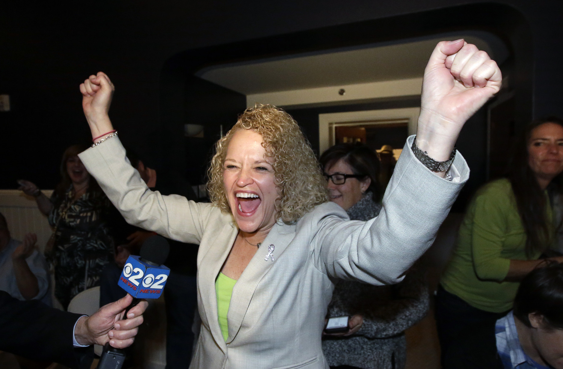 Former state lawmaker Jackie Biskupski reacts as results come in at her election night party for Salt Lake City Mayor, Tuesday, Nov. 3, 2015, in Salt Lake City. Biskupski faces incumbent Ralph Becker in the mayor's race, and would be the city's first openly gay leader if elected. (AP Photo/Rick Bowmer)