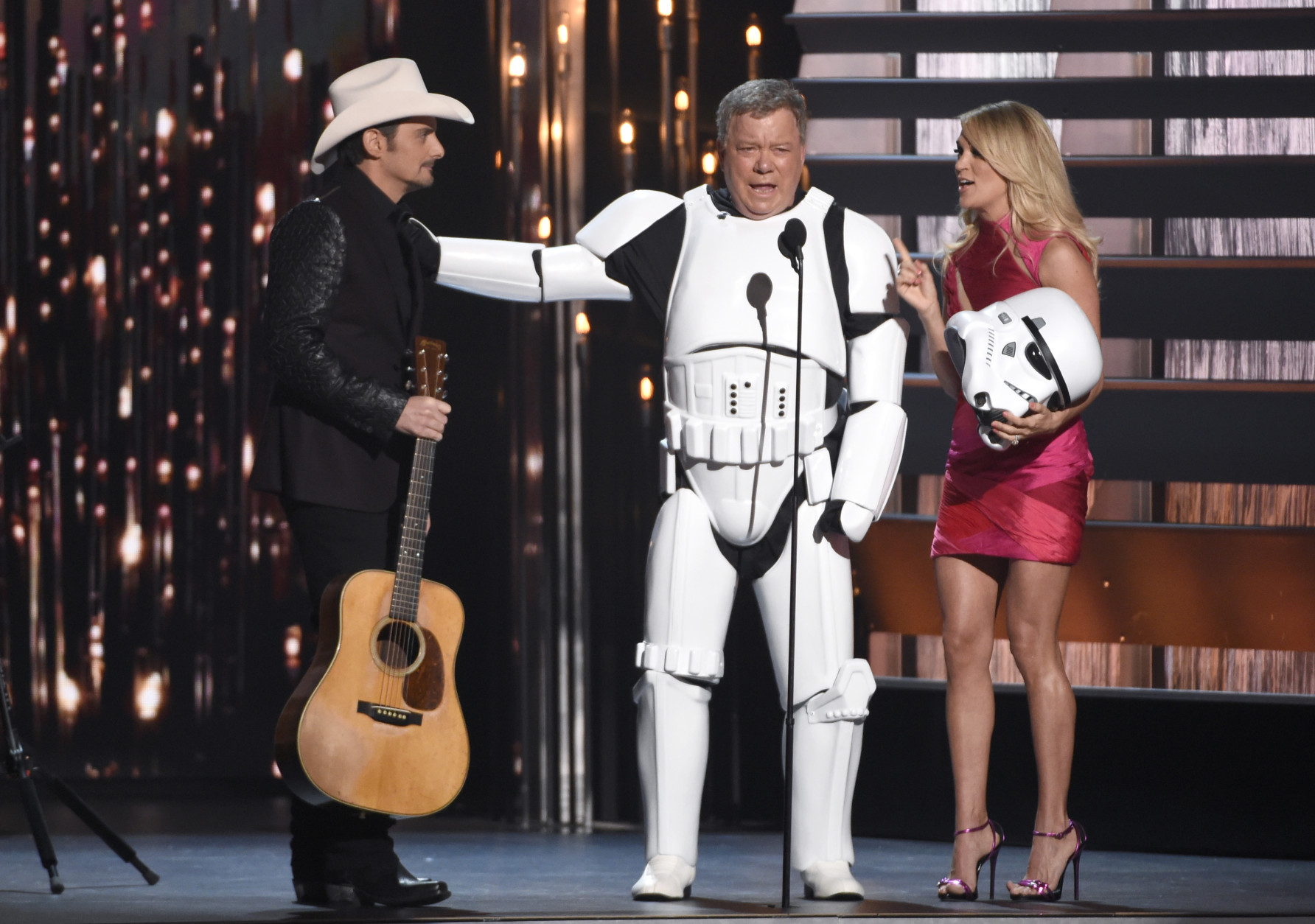 Brad Paisley, from left, William Shatner and Carrie Underwood perform a skit at the 49th annual CMA Awards at the Bridgestone Arena on Wednesday, Nov. 4, 2015, in Nashville, Tenn. (Photo by Chris Pizzello/Invision/AP)