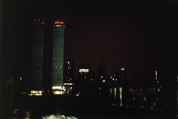 The twin towers of the World Trade Center and the southern tip of Manhattan are plunged into near darkness as a massive power failure hits New York City and surrounding suburbs, July 13, 1977. The power failure was attributed to lightning which hit several upstate transmission cables. In contrast to the northeast's 1965 blackout, there was severe looting in parts of the affected region. (AP Photo/Dave Pickoff)