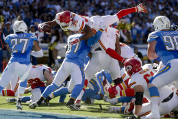 Kansas City Chiefs running back Charcandrick West, top, is kept out of the end zone by San Diego Chargers linebacker Joe Mays during the first half of an NFL football game Sunday, Nov. 22, 2015, in San Diego. (AP Photo/Lenny Ignelzi)