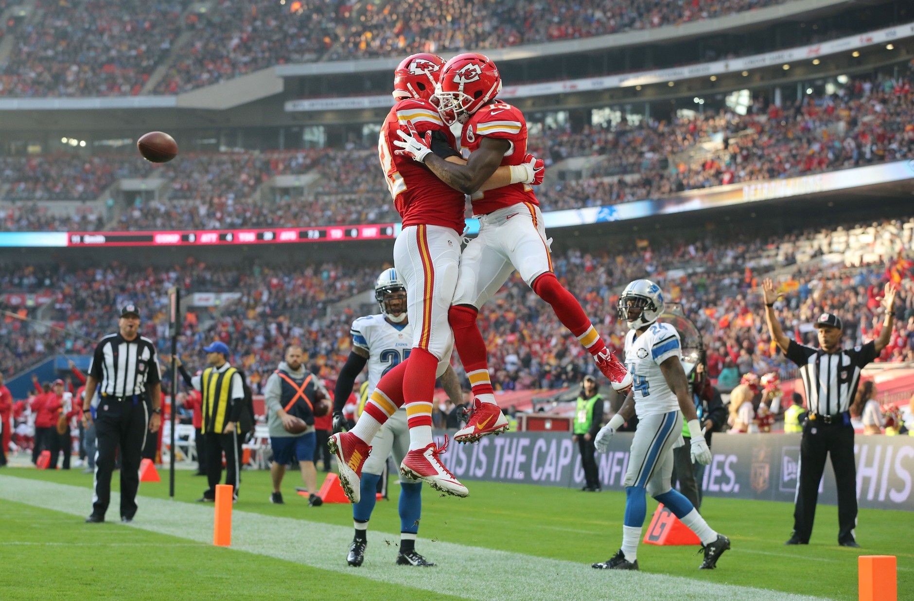 Kansas City Chiefs wide receiver De'Anthony Thomas (13), right, celebrates after scoring a touchdown during the NFL football game between Detroit Lions and Kansas City Chiefs Wembley Stadium in London,  Sunday, Nov. 1, 2015. (AP Photo/Tim Ireland)