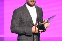 Sam Hunt accepts the award for new artist of the year at the American Music Awards at the Microsoft Theater on Sunday, Nov. 22, 2015, in Los Angeles. (Photo by Matt Sayles/Invision/AP)
