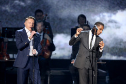 Macklemore, left, and Leon Bridges perform at the American Music Awards at the Microsoft Theater on Sunday, Nov. 22, 2015, in Los Angeles. (Photo by Matt Sayles/Invision/AP)
