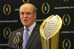 College Football Playoff executive director Bill Hancock announces that Atlanta will host the 2018 national championship game, Santa Clara, Calif., will host the 2019 game, and New Orleans will host the 2020 game, during a news conference Wednesday, Nov. 4, 2015, in Rosemont, Ill.  (AP Photo/Charles Rex Arbogast)