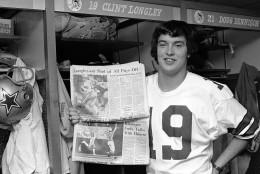 Clint Longley, Dallas Cowboys rookie quarterback, holds two of the local newspapers proclaiming his outstanding play in the Cowboys 24-23 victory over the Washington Redskins on Thursday, shown in Dallas, Texas on Nov. 29, 1974. Longley came in the third quarter after Roger Staubach was injured and guided the team from a 16-3 deficit to a last second victory with a 50-yard touchdown pass. (AP Photo/Harold Waters)