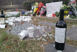 Makeshift memorial at the French Embassy in Washington Saturday morning. (WTOP/Kathy Stewart)