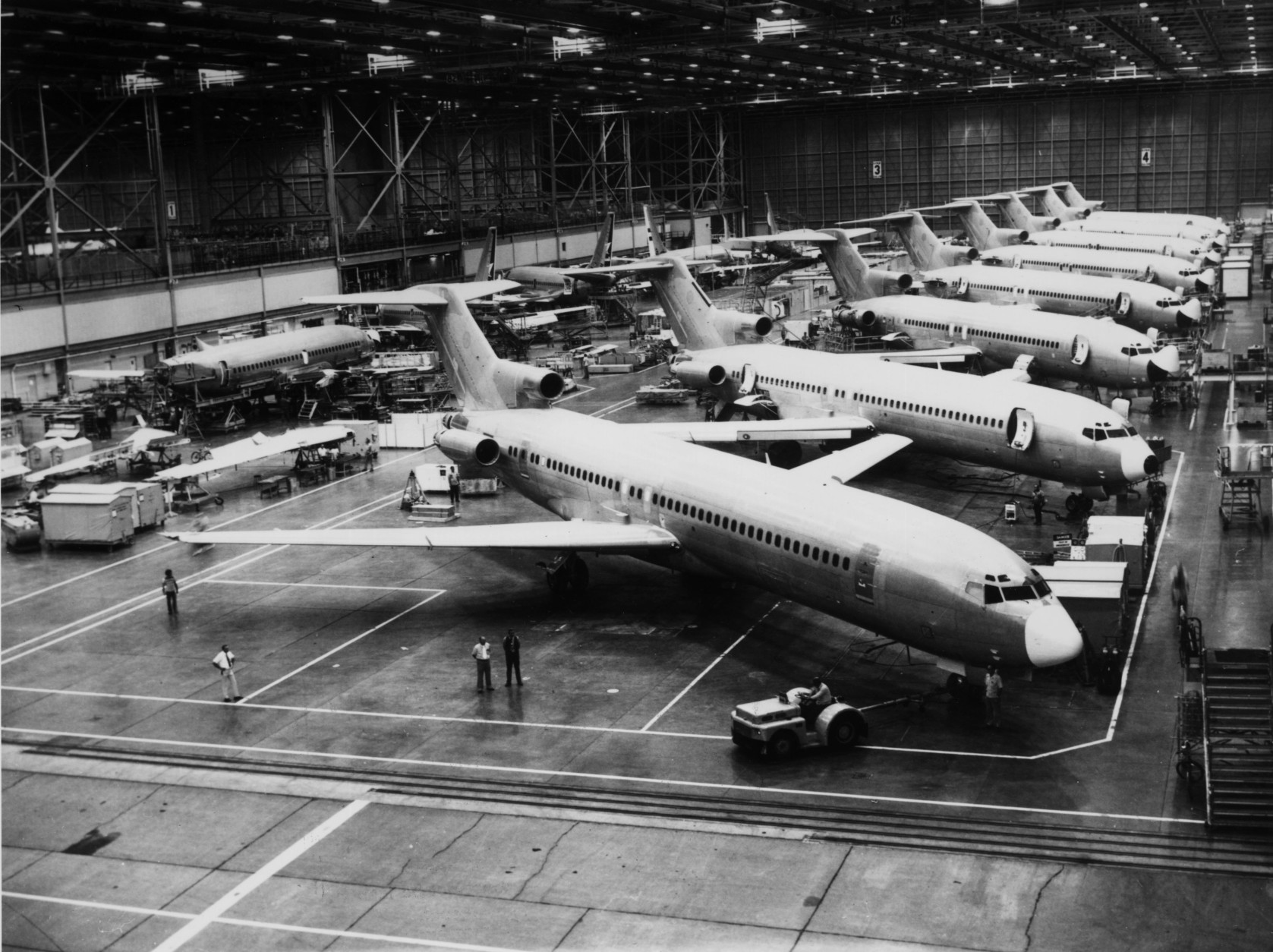 7th December 1978:  The latest Boeing 727 planes receiving the finishing touches in the air hangar at the Seattle production plant.  (Photo by Central Press/Getty Images)