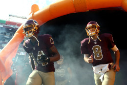 LANDOVER, MD - OCTOBER 25: Quarterback Kirk Cousins #8 of the Washington Redskins and wide receiver Ryan Grant #14 of the Washington Redskins run onto the field prior to a game against the Tampa Bay Buccaneers at FedExField on October 25, 2015 in Landover, Maryland. (Photo by Matt Hazlett/Getty Images)