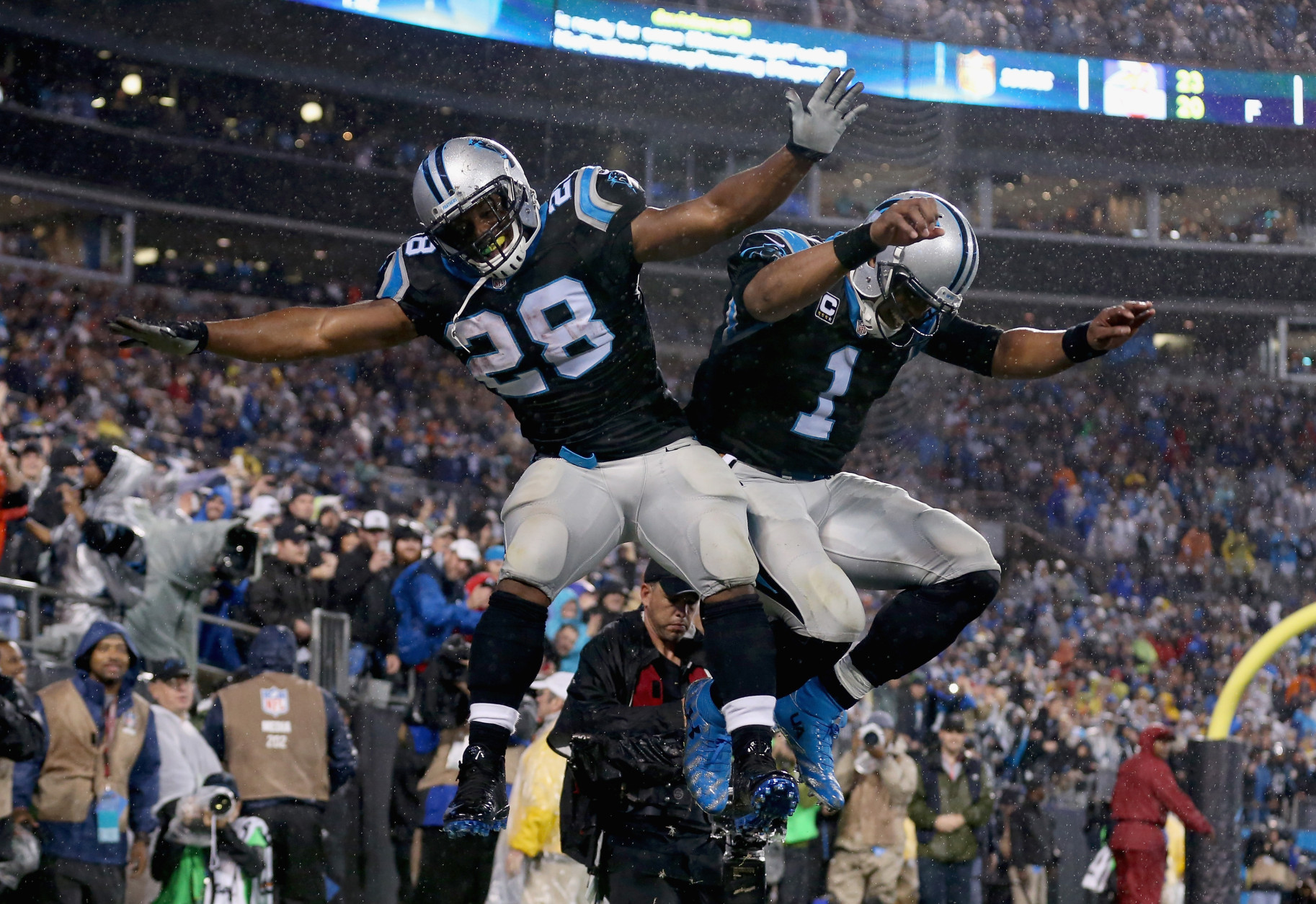 CHARLOTTE, NC - NOVEMBER 02:  Cam Newton #1 and  Jonathan Stewart #28 of the Carolina Panthers celebrate a touchdown against the Indianapolis Colts in the 1st quarter during their game at Bank of America Stadium on November 2, 2015 in Charlotte, North Carolina.  (Photo by Streeter Lecka/Getty Images)