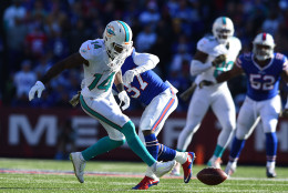 ORCHARD PARK, NY - NOVEMBER 08:   Nickell Robey #37 of the Buffalo Bills breaks up a reception meant for  Jarvis Landry #14 of the Miami Dolphins during the first half at Ralph Wilson Stadium on November 8, 2015 in Orchard Park, New York.  (Photo by Rich Barnes/Getty Images)