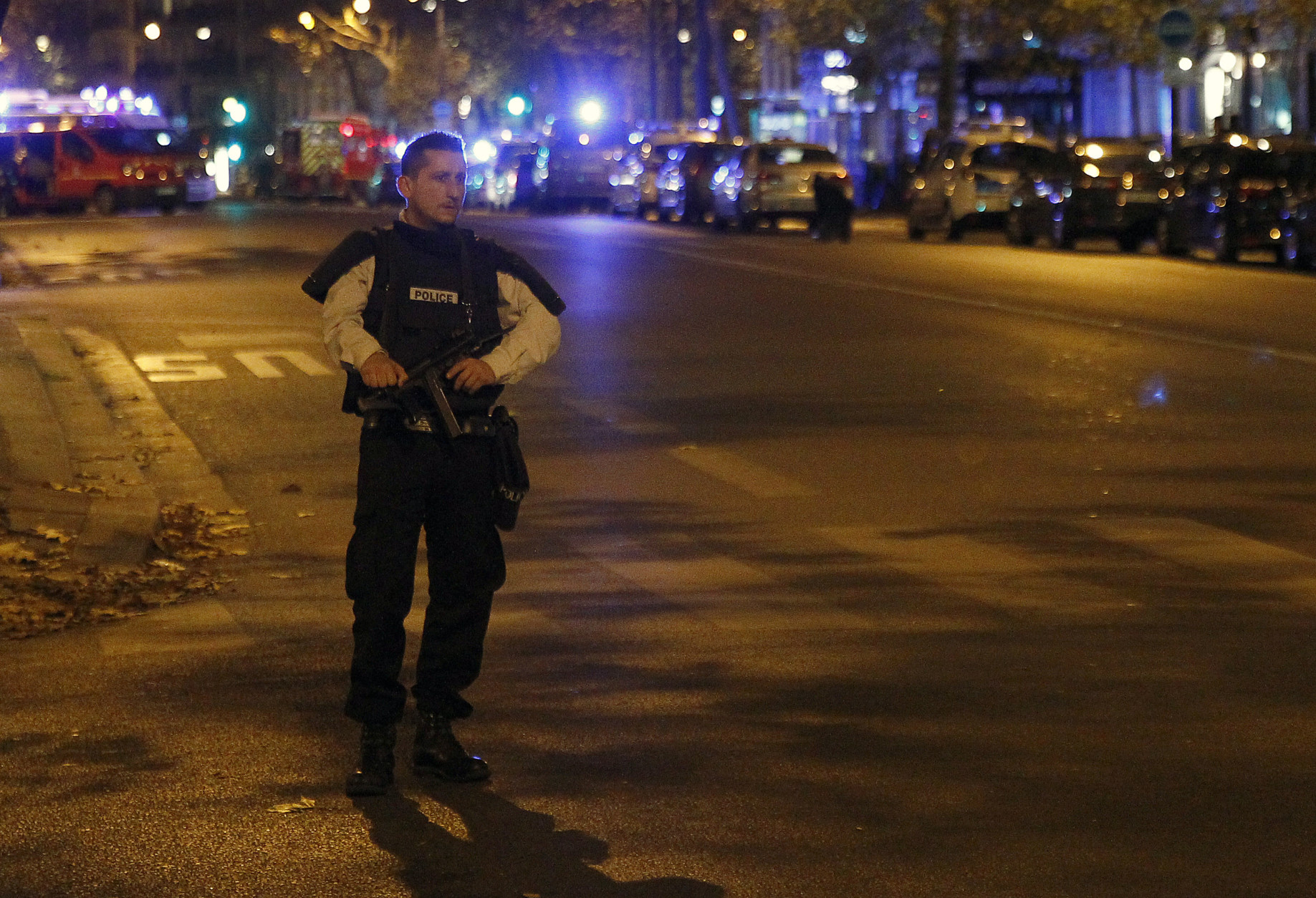 PARIS, FRANCE - NOVEMBER 13:  Police survey the area of Boulevard Baumarchais after an attack in the French capital on November 13, 2015 in Paris, France. At least 18 people were killed in a series of gun attacks across Paris, as well as explosions outside the national stadium where France was hosting Germany.  (Photo by Thierry Chesnot/Getty Images)