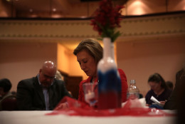 GREENFIELD, IA - NOVEMBER 13:  Republican presidential candidate Carly Fiorina (C) participates in a moment of silence for the victims of today's attacks in Paris during the 2015 Lincoln Dinner of Adair County Republican Party November 13, 2015 in Greenfield, Iowa. Fiorina continued to campaign for the Republican nomination for U.S. president.  (Photo by Alex Wong/Getty Images)