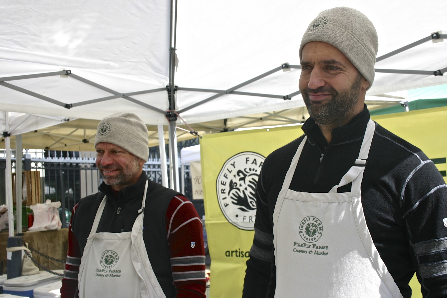 When you go to the farmer's market at Dupont Circle on Sunday mornings, you'll probably meet Michael Koch and Pablo Solanet of Firefly Farms, producers of locally made goat cheeses. (WTOP/Kate Ryan)