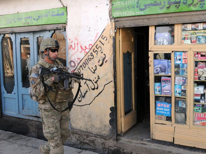 Then-1st Lt. Florent Groberg, platoon leader of 4th Platoon, Company D, 2nd Battalion, 12th Infantry Regiment, Task Force Lethal, patrols the city streets of Asad Abad, Afghanistan, Feb. 9, 2010. The unit was there to perform a pre-meeting security check of the area. (Courtesy U.S. Army)