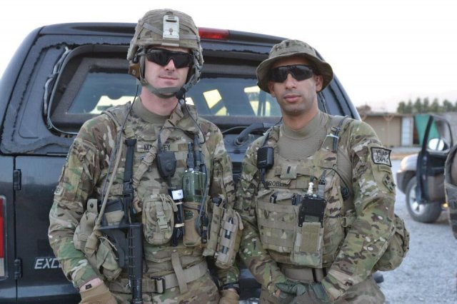 U.S. Army Sgt. Andrew Mahoney, left, of Laingsburg, Mich., is shown with then-1st Lt. Florent Groberg serving on a personal security detail with the 4th Infantry Brigade Combat Team, 4th Infantry Division, during a deployment to Regional Command-East, Afghanistan. (Courtesy photo)
