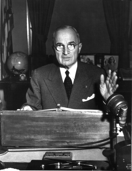 President Truman declaring a state of emergency on the radio, December 1950, United States, Korean War, Washington, National Archives. (Photo by Photo12/UIG/Getty Images)