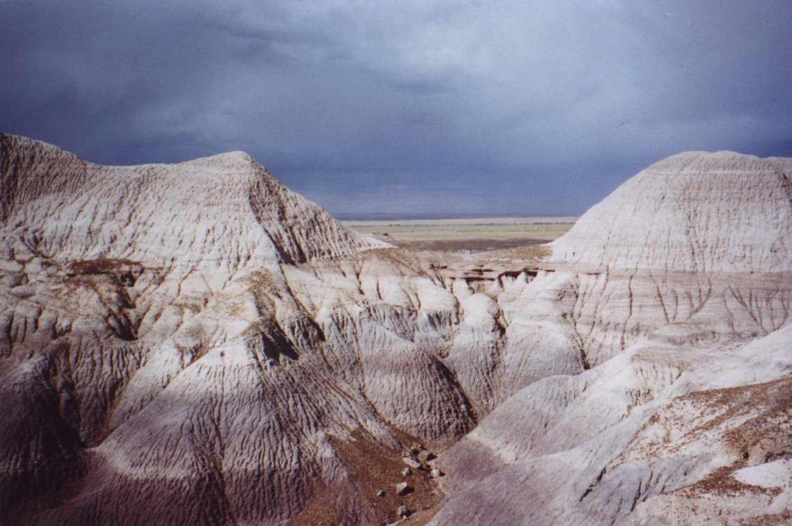 A storm rolls in over the Petrified Forest National Park in Arizona, Oct. 6, 2001, showing off the unique purplish-blue hills of the Blue Mesa trail. The 93,533-acre park is located in eastern Arizona, 25 miles north of Holbrook. (AP Photo/Alisa Blackwood)
