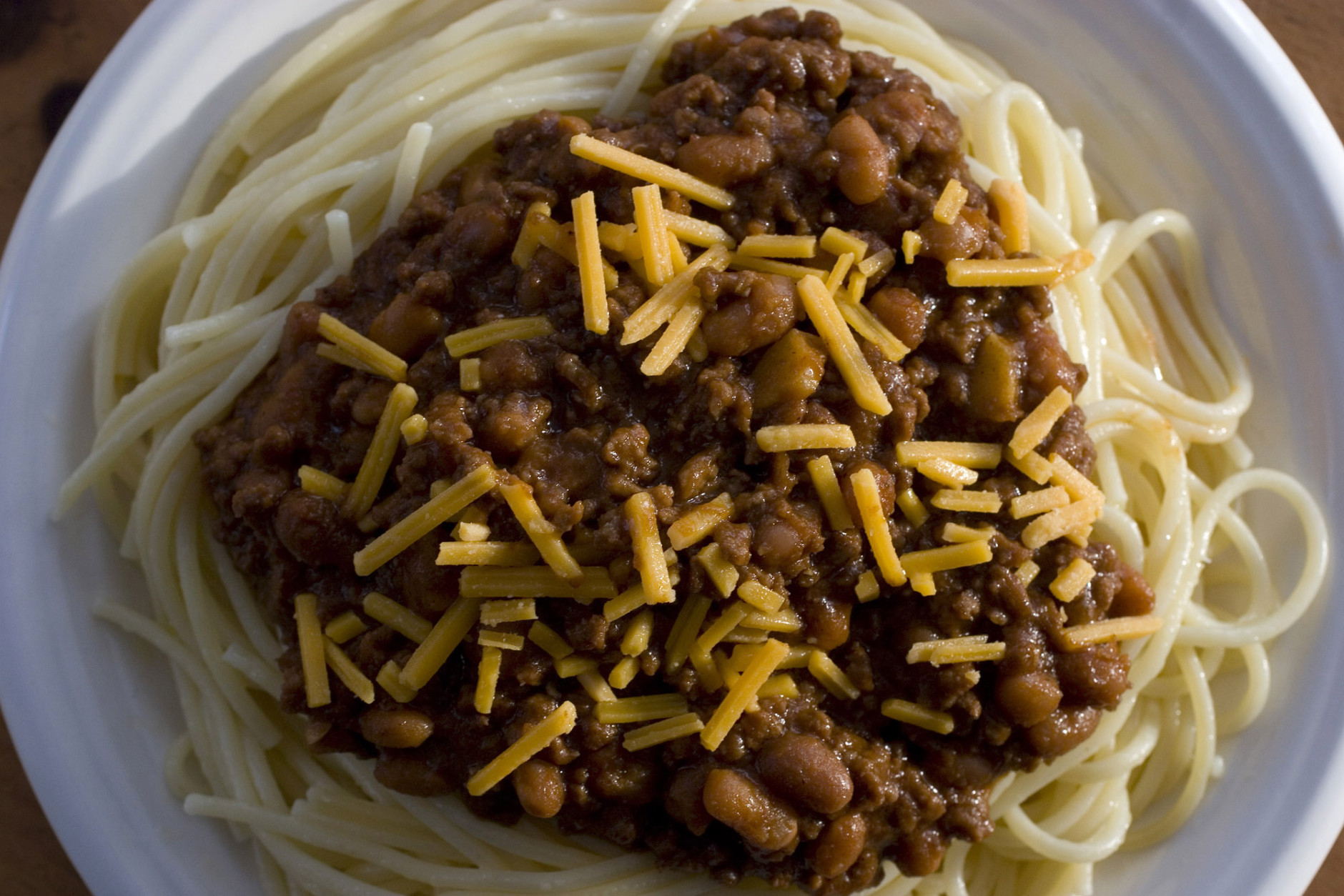**FOR USE WITH AP LIFESTYLES**   Three-way Cincinnati Chili layers spaghetti, a quick cooking chili and cheese as seen here in this Tuesday, March 25, 2008 photo. The regional favorite is ordered by the number of toppings, with a four way having another topping like onion or beans.    (AP Photo/Larry Crowe)