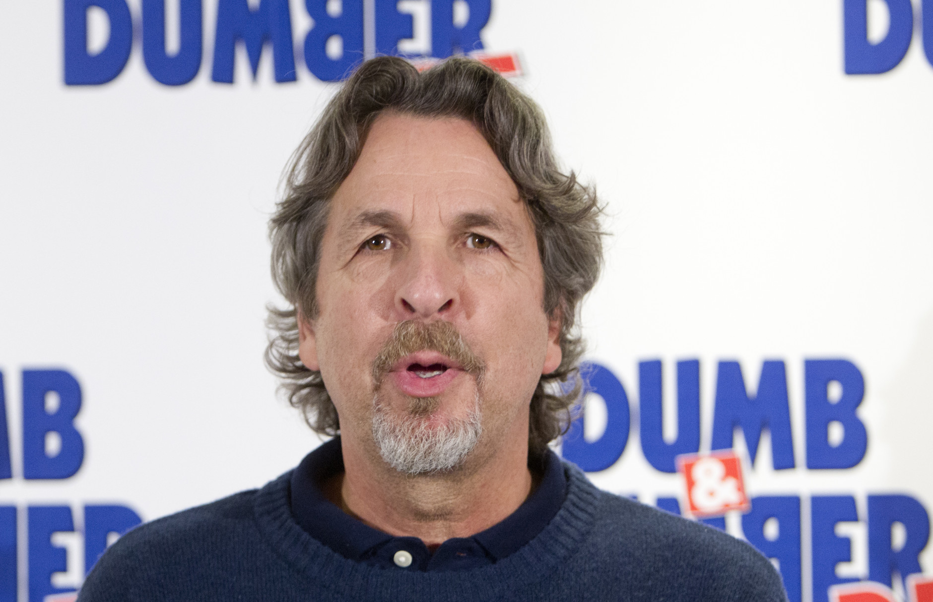 Director  Peter Farrelly poses  for photographers for the Dumb and Dumber to Photo Call  in Paris, France. Tuesday, Nov. 20, 2014. (AP Photo/Jacques Brinon)