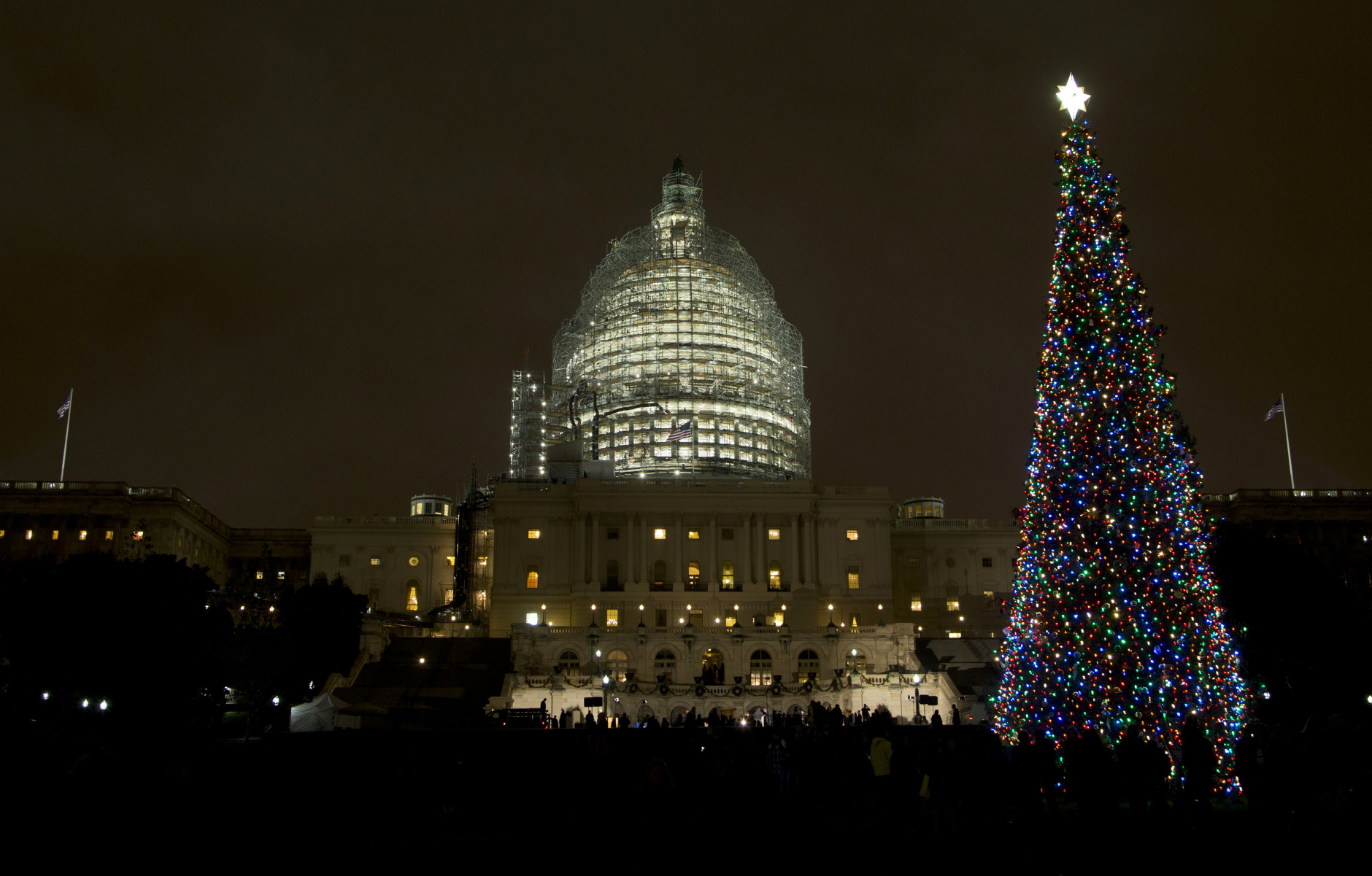 The U.S. Capitol Christmas tree is lit, after a ceremony on the West Front of the Capitol in Washington, Wednesday, Dec. 2, 2015. The 2015 U.S. Capitol Christmas Tree is a 74 feet Lutz tree from Chugach National Forest in Alaska.   (AP Photo/Manuel Balce Ceneta)