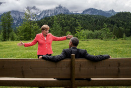 FOR USE AS DESIRED, YEAR END PHOTOS - FILE - German chancellor Angela Merkel  speaks with U.S. president Barack Obama at  Schloss Elmau hotel near Garmisch-Partenkirchen, southern Germany, Monday June 8, 2015 during the G-7 summit.  (Michaek Kappeler/Pool Photo via AP, File)