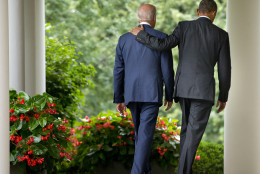 FOR USE AS DESIRED, YEAR END PHOTOS - FILE - President Barack Obama walks with Vice President Joe Biden back to the Oval Office of the White House in Washington, Thursday, June 25, 2015, after speaking in the Rose Garden after the Supreme Court upheld the subsidies for customers in states that do not operate their own exchanges under President Barack Obama's Affordable Care Act. (AP Photo/Pablo Martinez Monsivais, File)