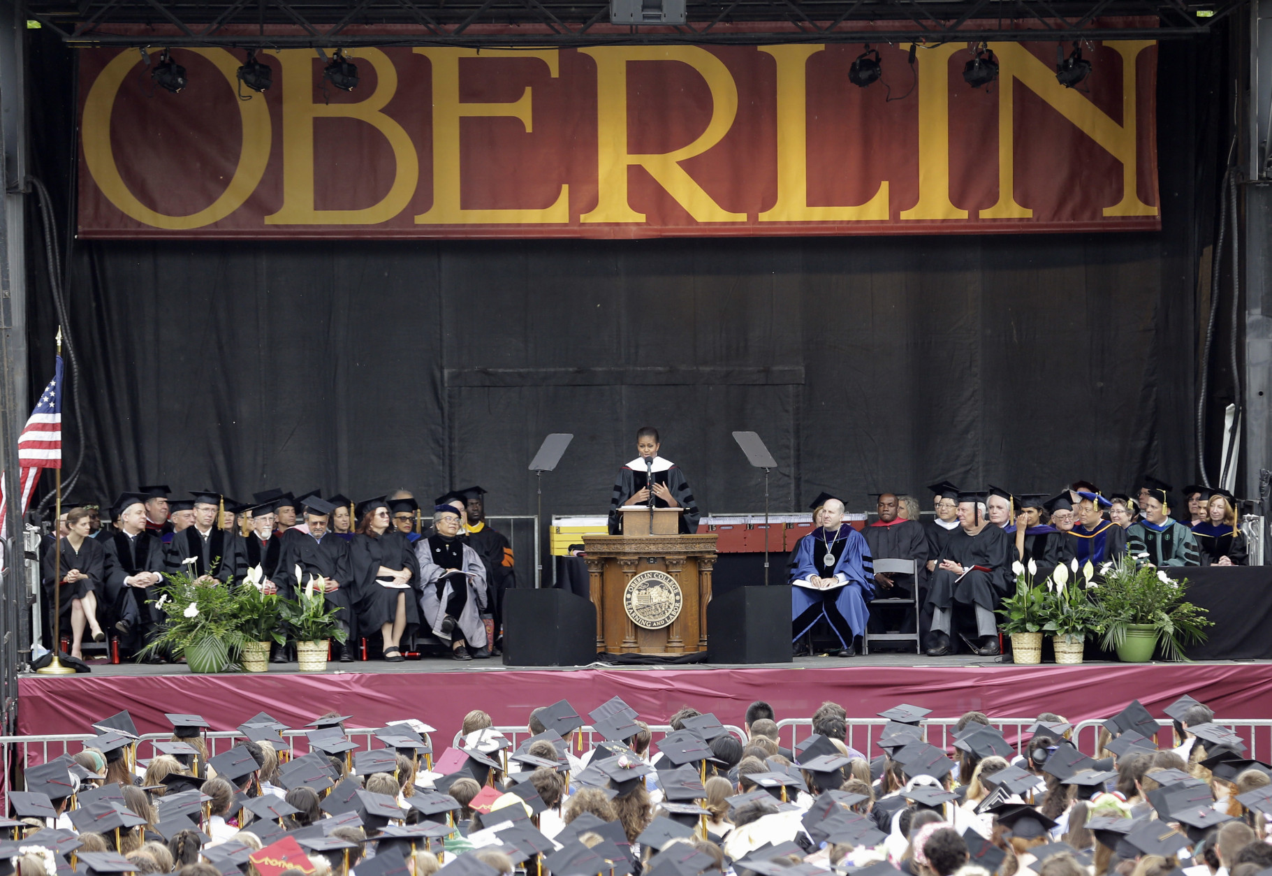 First lady Michelle Obama speaks after receiving an Honorary Degree of Doctor of Humanities from Oberlin College, Monday, May 25, 2015, in Oberlin, Ohio. (AP Photo/Tony Dejak)