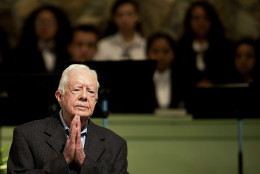 FOR USE AS DESIRED, YEAR END PHOTOS - FILE - Former President Jimmy Carter teaches Sunday School class at Maranatha Baptist Church in his hometown Sunday, Aug. 23, 2015, in Plains, Ga. The 90-year-old Carter gave one lesson to about 300 people filling the small Baptist church that he and his wife, Rosalynn, attend. It was Carter's first lesson since detailing the intravenous drug doses and radiation treatment planned to treat melanoma found in his brain after surgery to remove a tumor from his liver. (AP Photo/David Goldman, File)