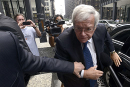 FOR USE AS DESIRED, YEAR END PHOTOS - FILE - Former House Speaker Dennis Hastert arrives at the federal courthouse, Tuesday, June 9, 2015, in Chicago for his arraignment on federal charges that he broke federal banking laws and lied about the money when questioned by the FBI. The indictment two weeks ago alleged Hastert agreed to pay $3.5 million to someone from his days as a high school teacher not to reveal a secret about past misconduct. (AP Photo/Paul Beaty, File)