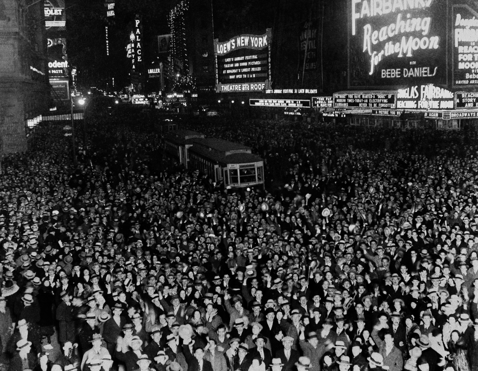 New York City's Broadway looking north from Times Square, as thousand of revelers jammed the streets to usher in the New Year, Dec. 31, 1930. (AP Photo)